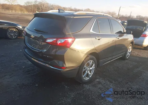 2018 Chevrolet Equinox Premier z USA, uszkodzony, nr VIN 2GNAXVEV9J6320399